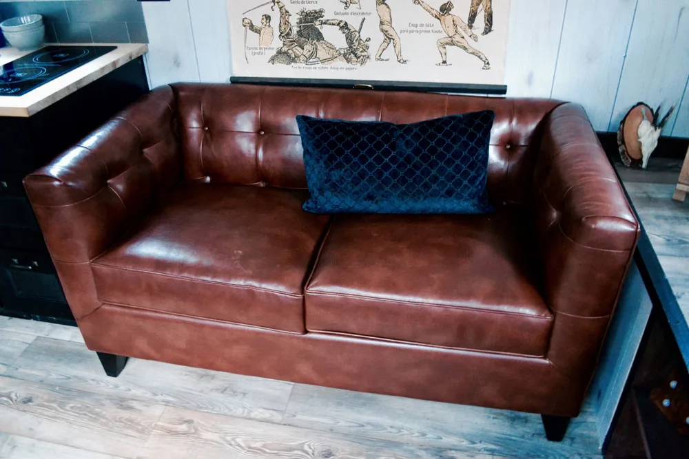 Leather couch - Aerodynamic by Tiny Heirloom