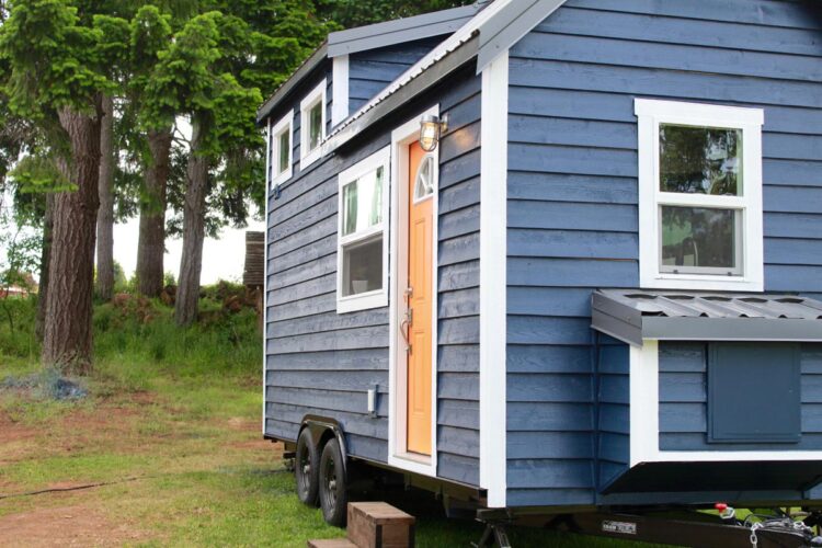 Pretty blue exterior and white trim - Craftsman by Tiny Heirloom
