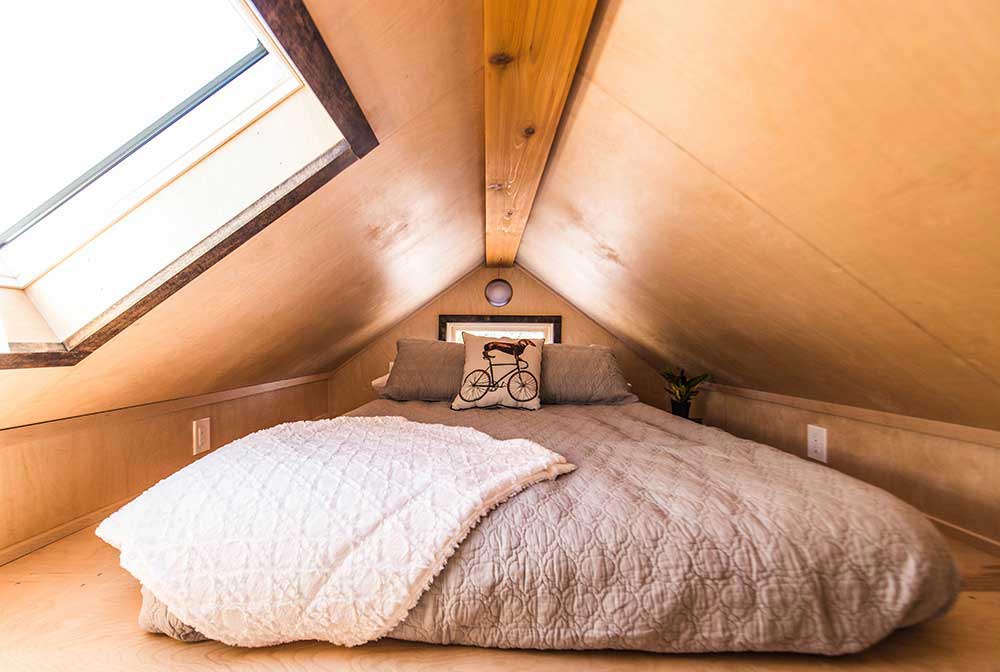 Sleeping loft with skylight - Farallon by Tumbleweed Tiny House Company