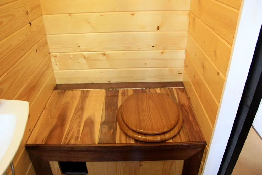 Composting toilet and kitty litter area - Fort Austin by Brevard Tiny House