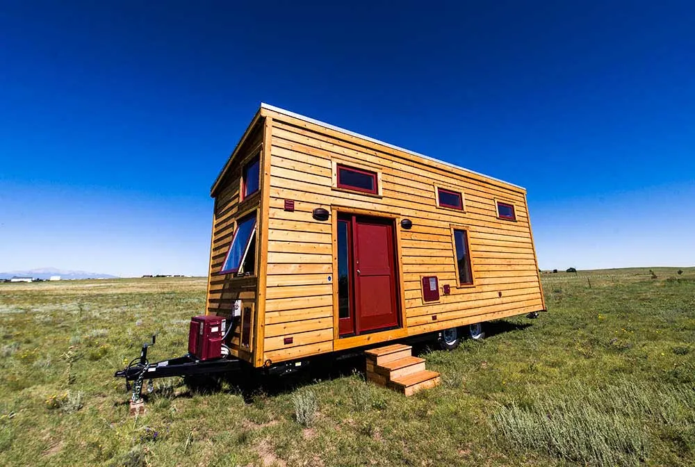 Classic wood exterior with modern fixtures - Roanoke by Tumbleweed Tiny House