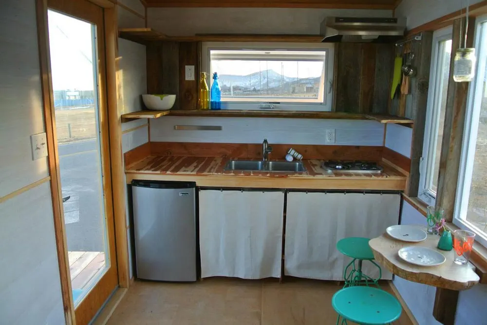 Kitchen with under-counter refrigerator - Boulder by Rocky Mountain Tiny Houses