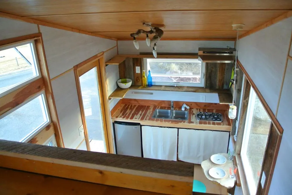 View of kitchen from bedroom loft - Boulder by Rocky Mountain Tiny Houses