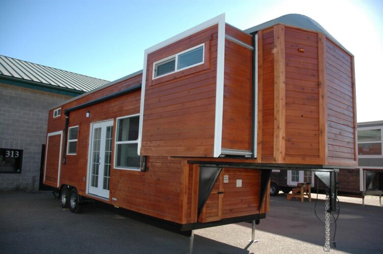 Tiny house with three slide outs - Carpathian by Tiny Idahomes