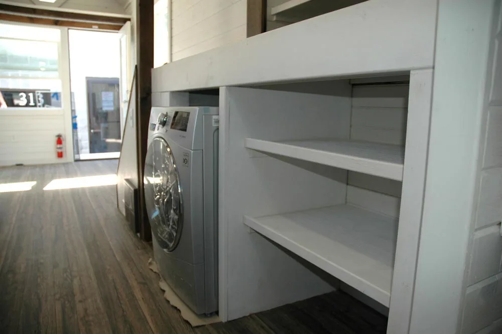 Washer/dryer and storage area - Clear Creek by Tiny Idahomes