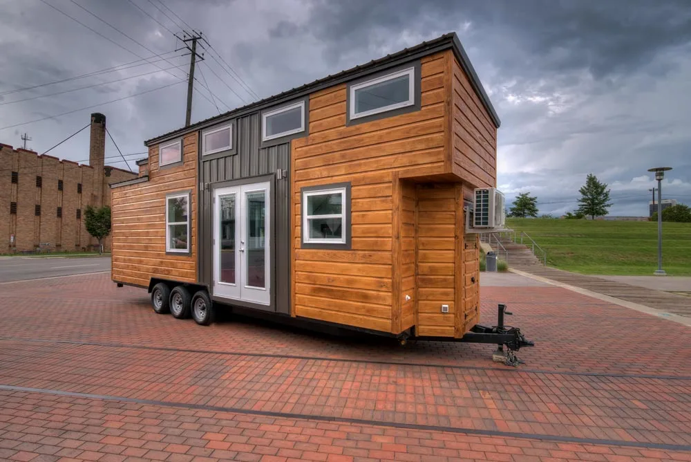 Triple axle tiny house on wheels - Freedom by Alabama Tiny Homes