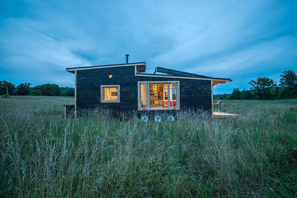 Off-grid house with solar panels - Greenmoxie Tiny House