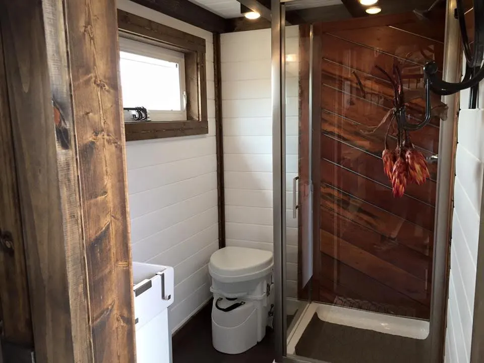 Bathroom with tiger wood shower - Lookout by Tiny House Chattanooga