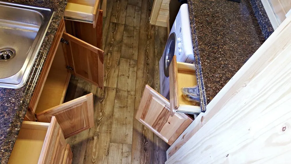Hickory cabinet, vinyl floors - Phoenix by Tiny Idahomes