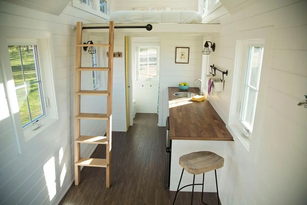 Kitchen and ladder to bedroom loft - Pecan by Perch & Nest