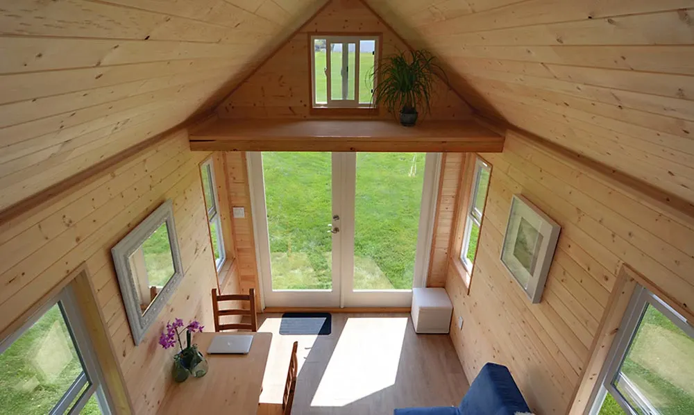 Living room with storage loft overhead - Poco Edition by Mint Tiny Homes