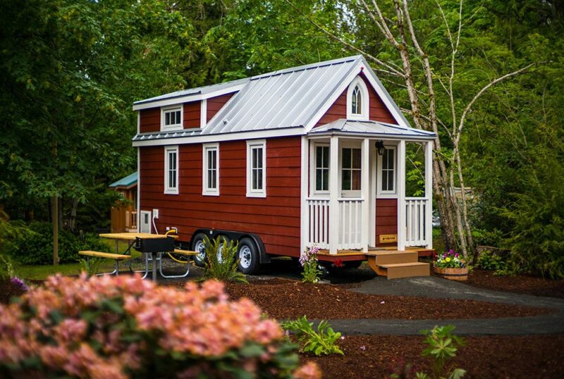 Red siding with white trim exterior - Scarlett at Mt. Hood Tiny House Village