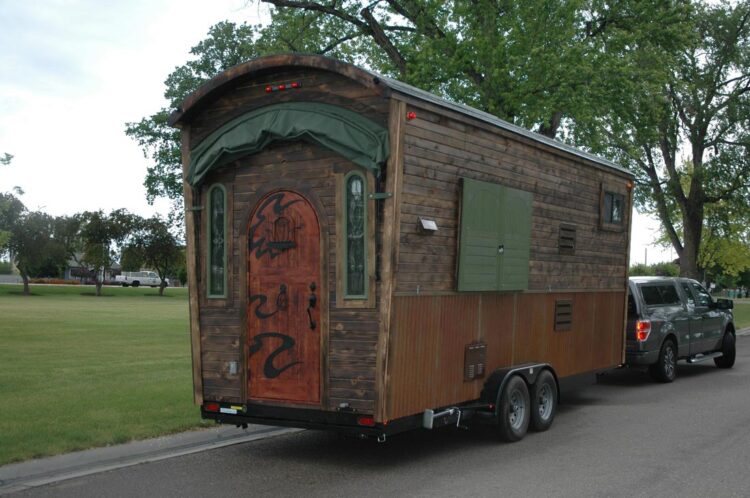 Tiny house exterior with burnt cedar and rusted corrugated steel - Zamora Vardo by Tiny Idahomes