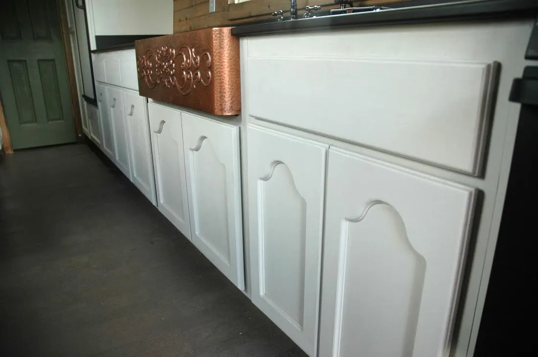 Custom cabinets and copper farm sink - Zamora Vardo by Tiny Idahomes