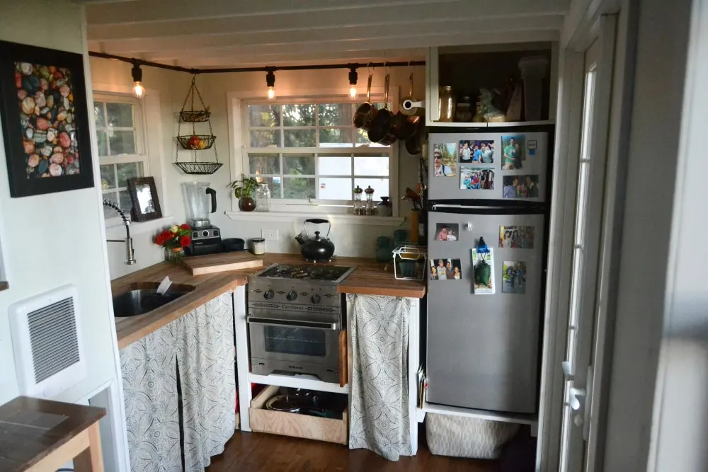 Kitchen w/ Stove & Refrigerator - Tiny House by Liz & Tyler Cragg