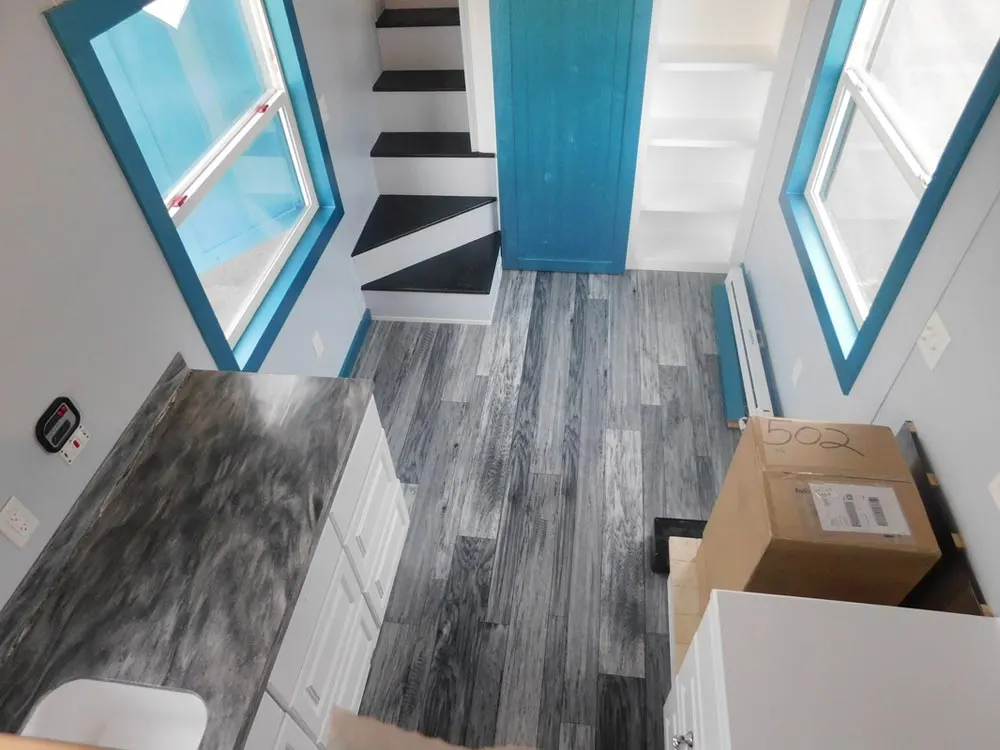 Matching Flooring and Countertop Colors - French Storyteller by Tiny Idahomes
