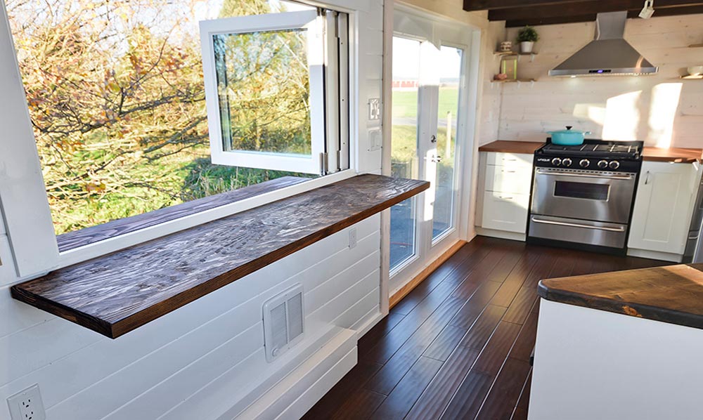 Table and Large Windows - Custom House by Mint Tiny Homes