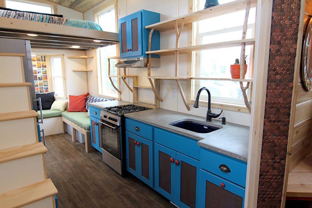 Kitchen with Concrete Counters - Custom Fabricated Siding - Elise & Clara's Tiny House by MitchCraft Tiny Homes