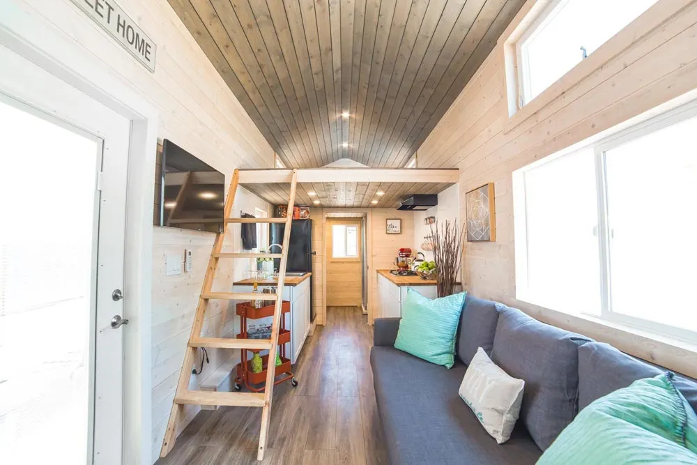 Living Room & Kitchen - Bunkhouse by Uncharted Tiny Homes
