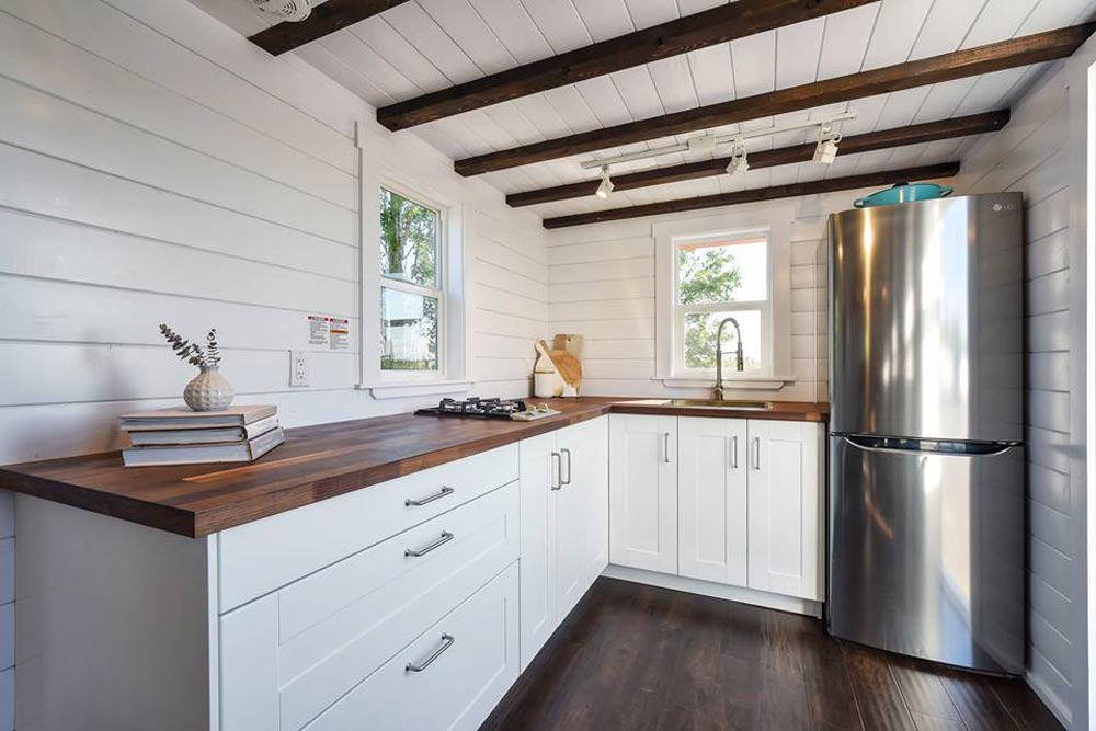 Kitchen w/ Full Size Refrigerator - Custom Loft Edition by Mint Tiny Homes