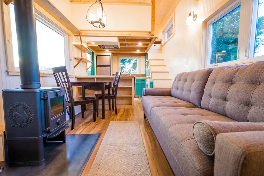 Couch & Stove - Laura's Tiny House by MitchCraft Tiny Homes