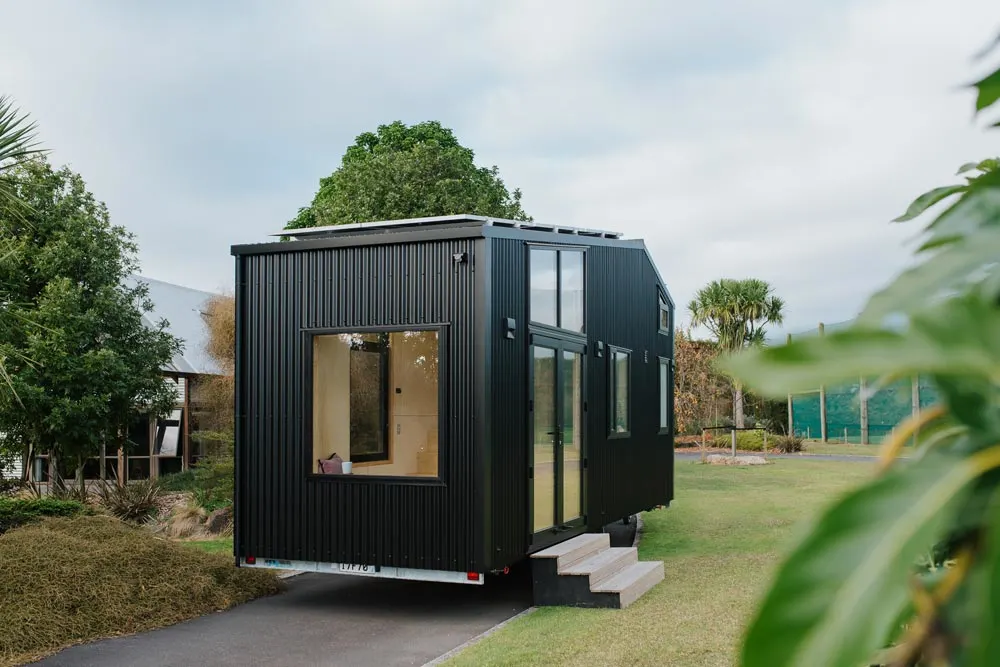 Black Corrugated Metal - First Light Tiny House by Build Tiny