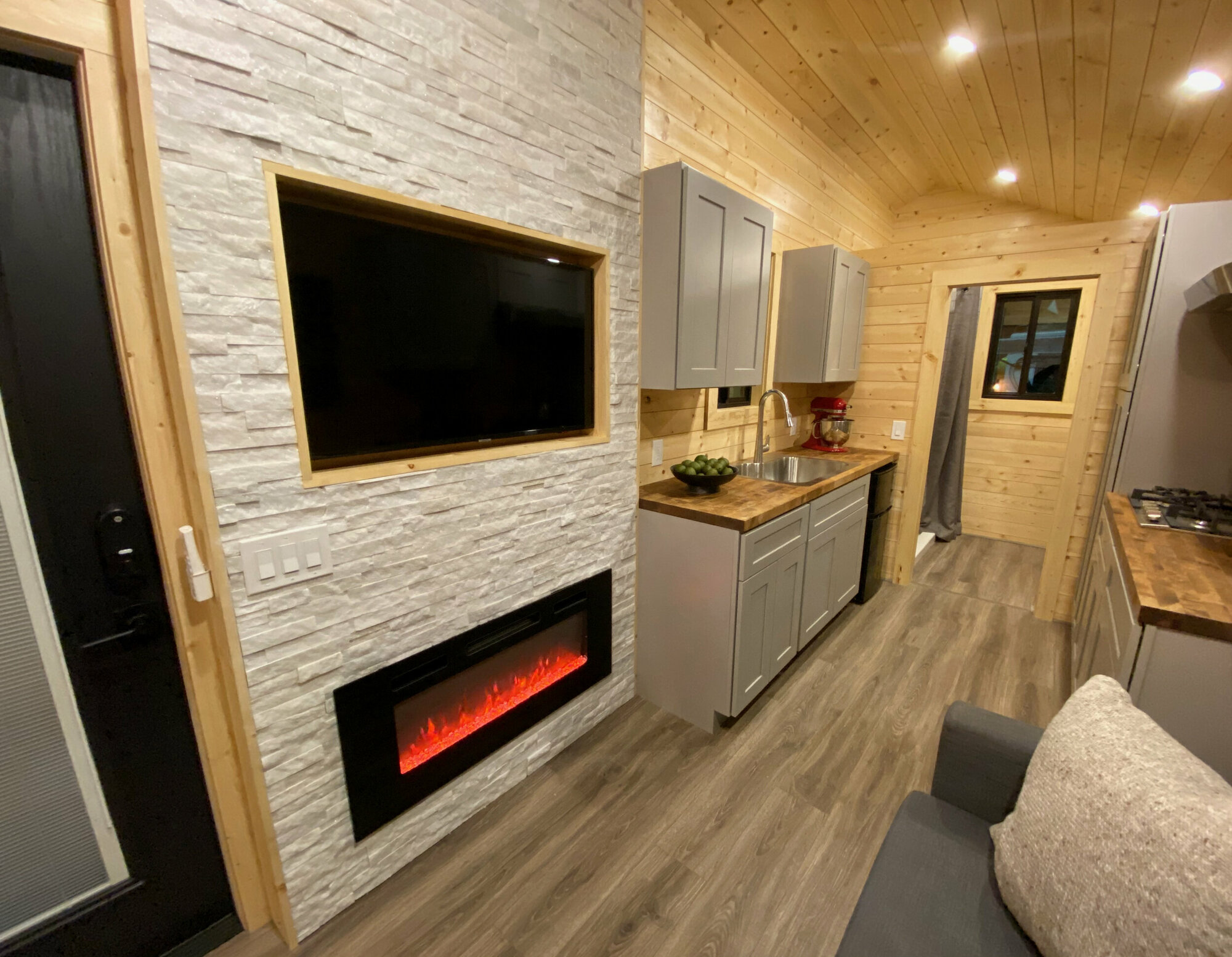 Fireplace & TV - Flat by Uncharted Tiny Homes