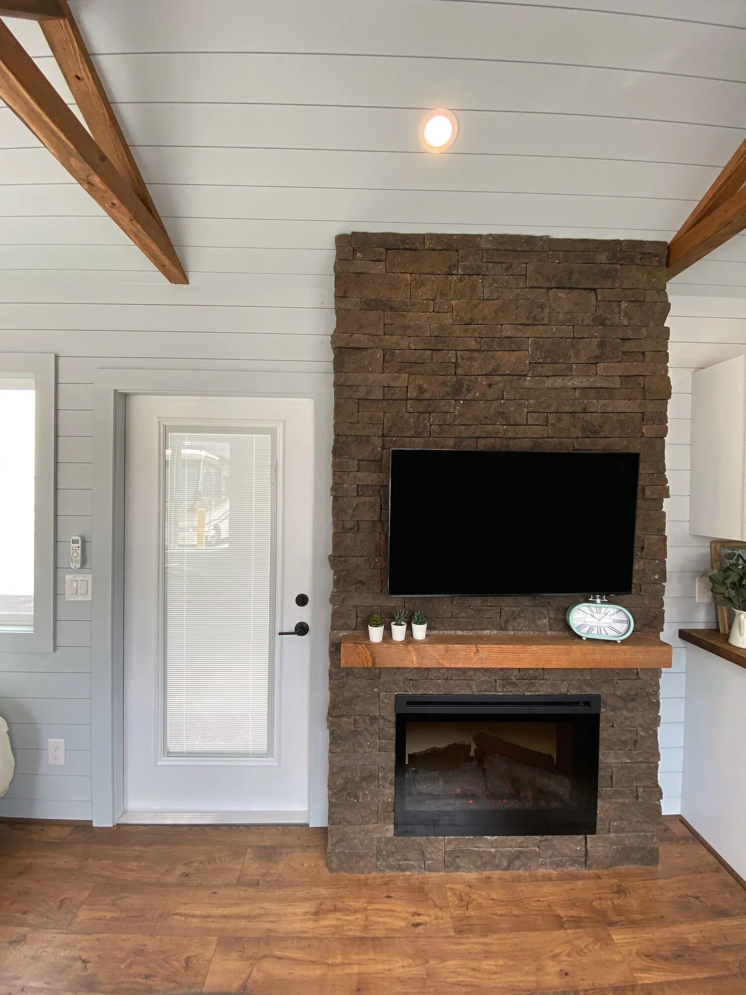 Stone Entertainment Center - Lauren's Flat by Uncharted Tiny Homes