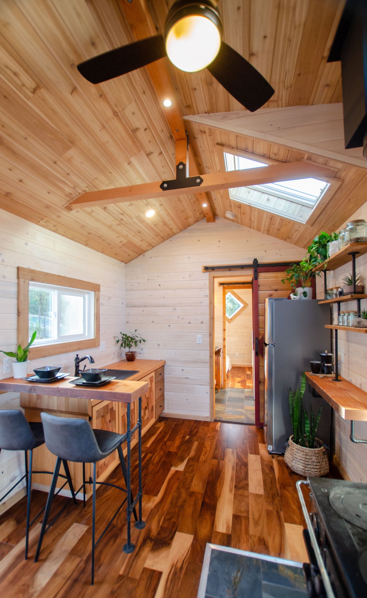 Huckleberry by Rewild Homes - Kitchen w/ Ceiling Fan