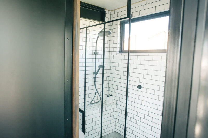 Tile Shower - Portable Hotel Room by Contained