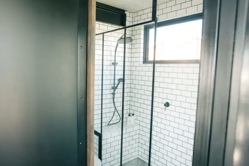 Tile Shower - Portable Hotel Room by Contained