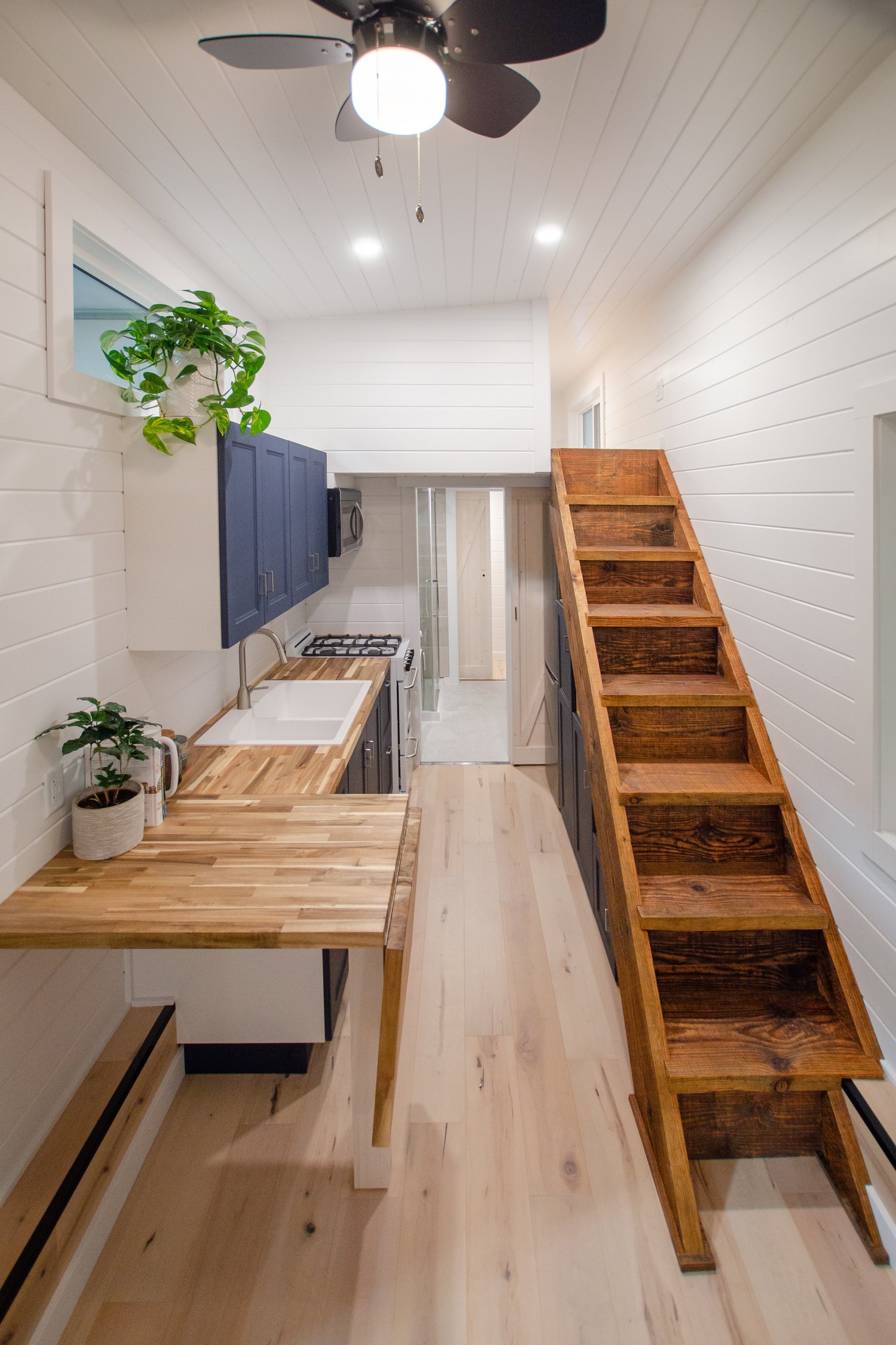 Kitchen And Loft Stairs - Salish Sea by Rewild Homes