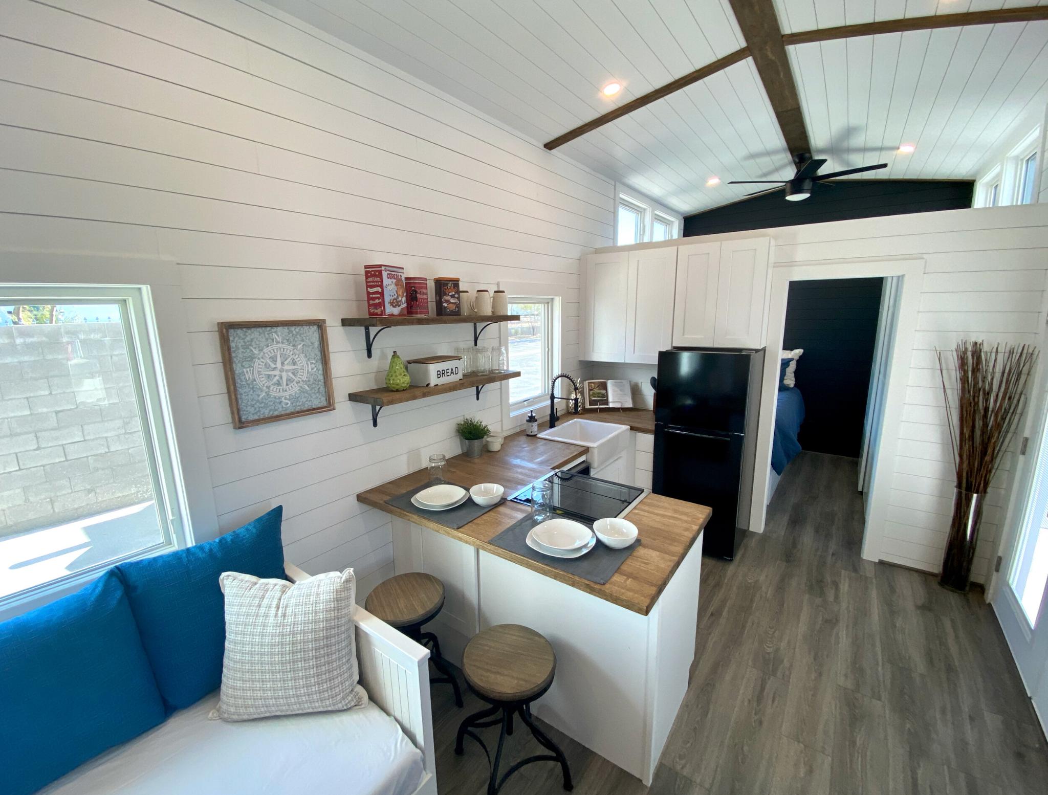 Living Room & Kitchen - Jen's Château by Uncharted Tiny Homes