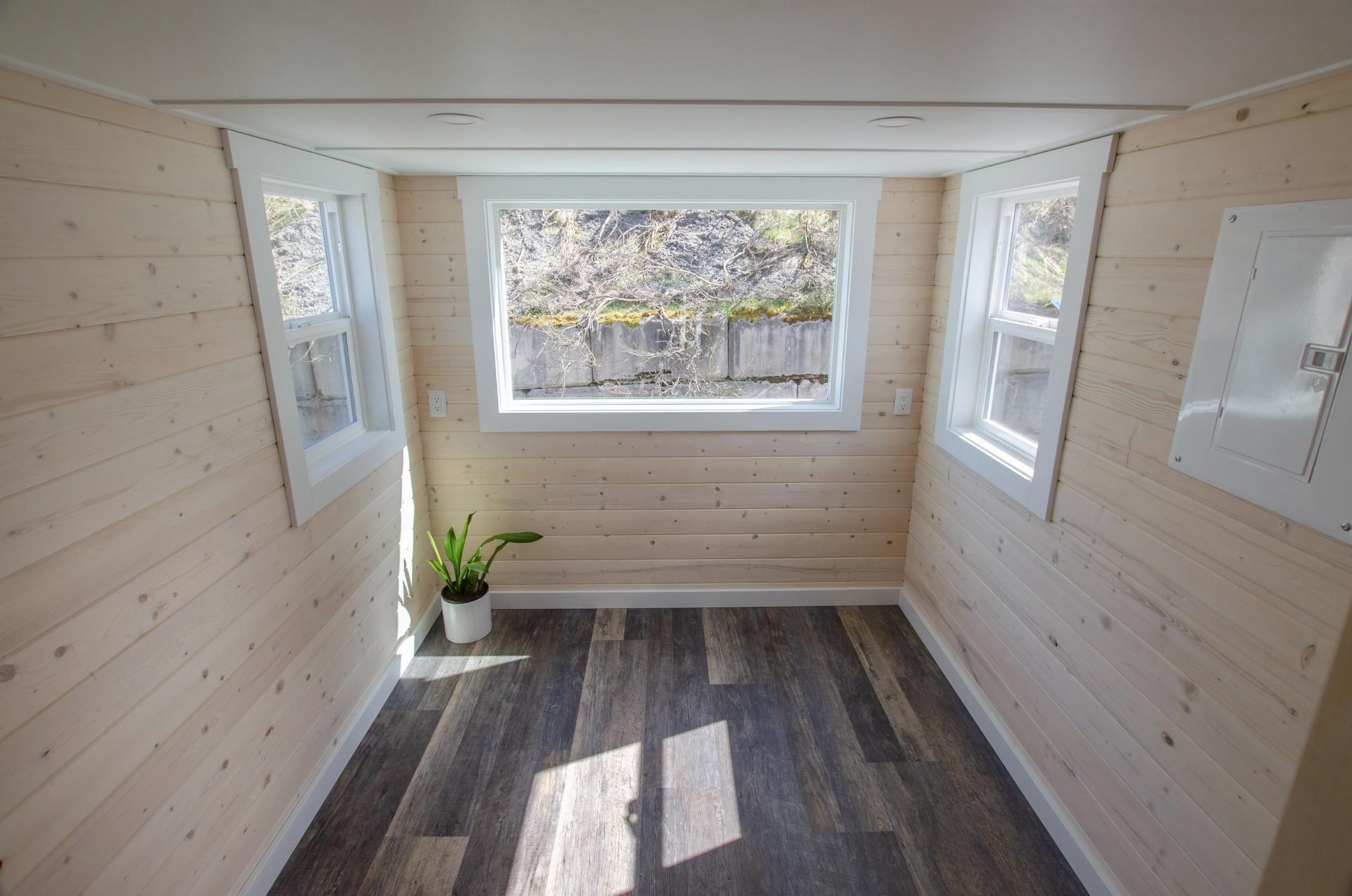 Main Floor Bedroom with Three Windows - Burrow by Rewild Homes