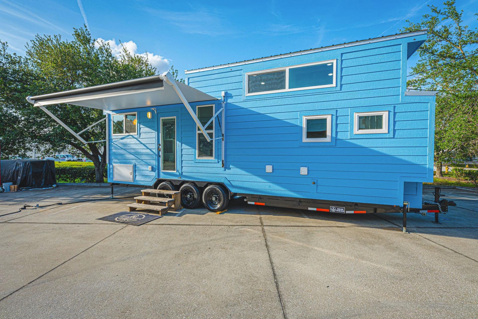 Bright Blue Exterior with Awning Extended - Cavin by Movable Roots