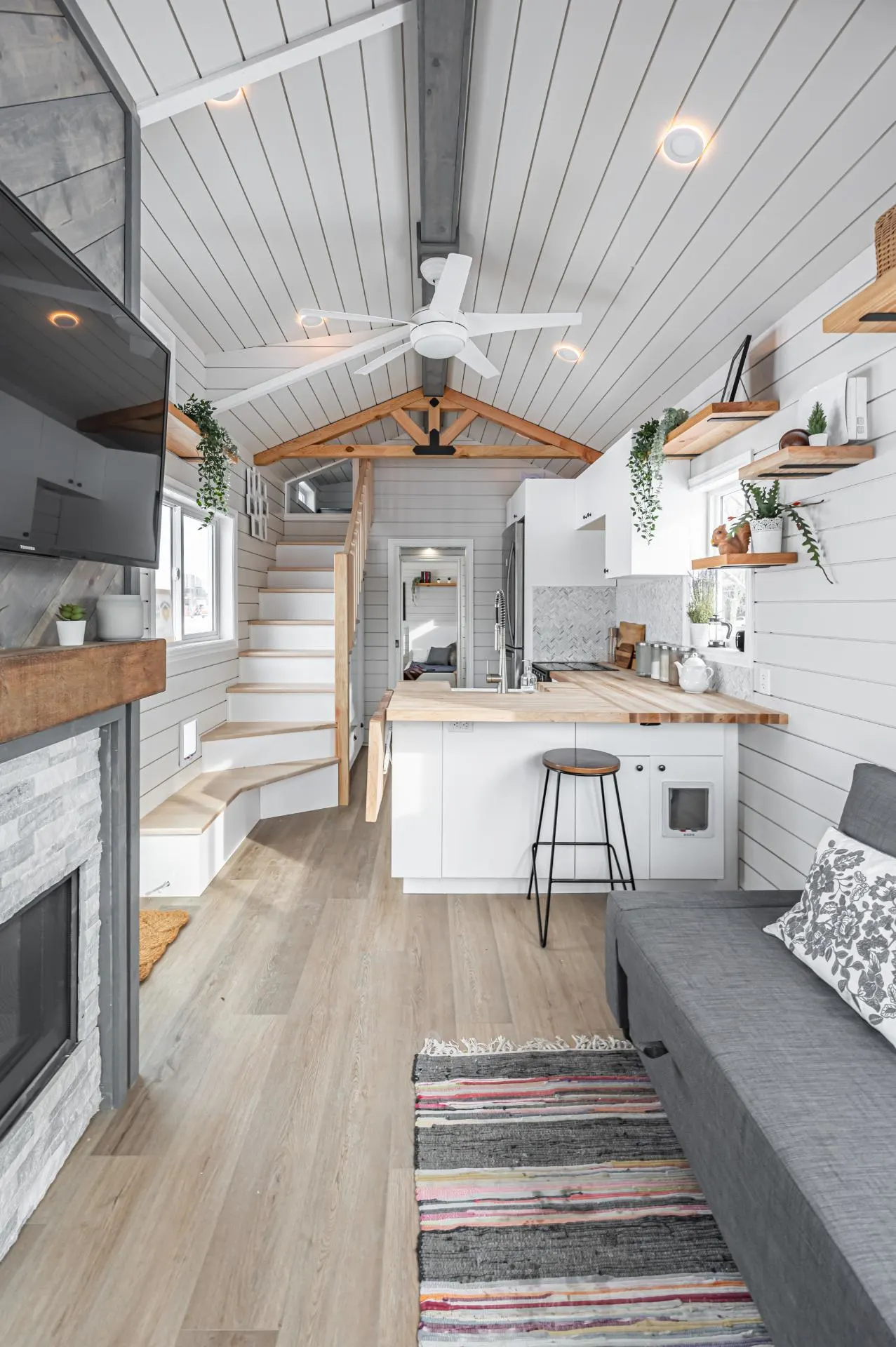 Living Room with TV - Paradise Paddock by Acorn Tiny Homes