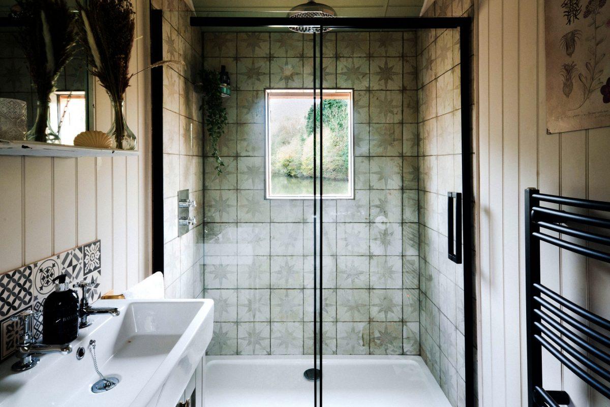Tile Shower with Glass Door - Hut 1898 at The Shepherds Hut Retreat