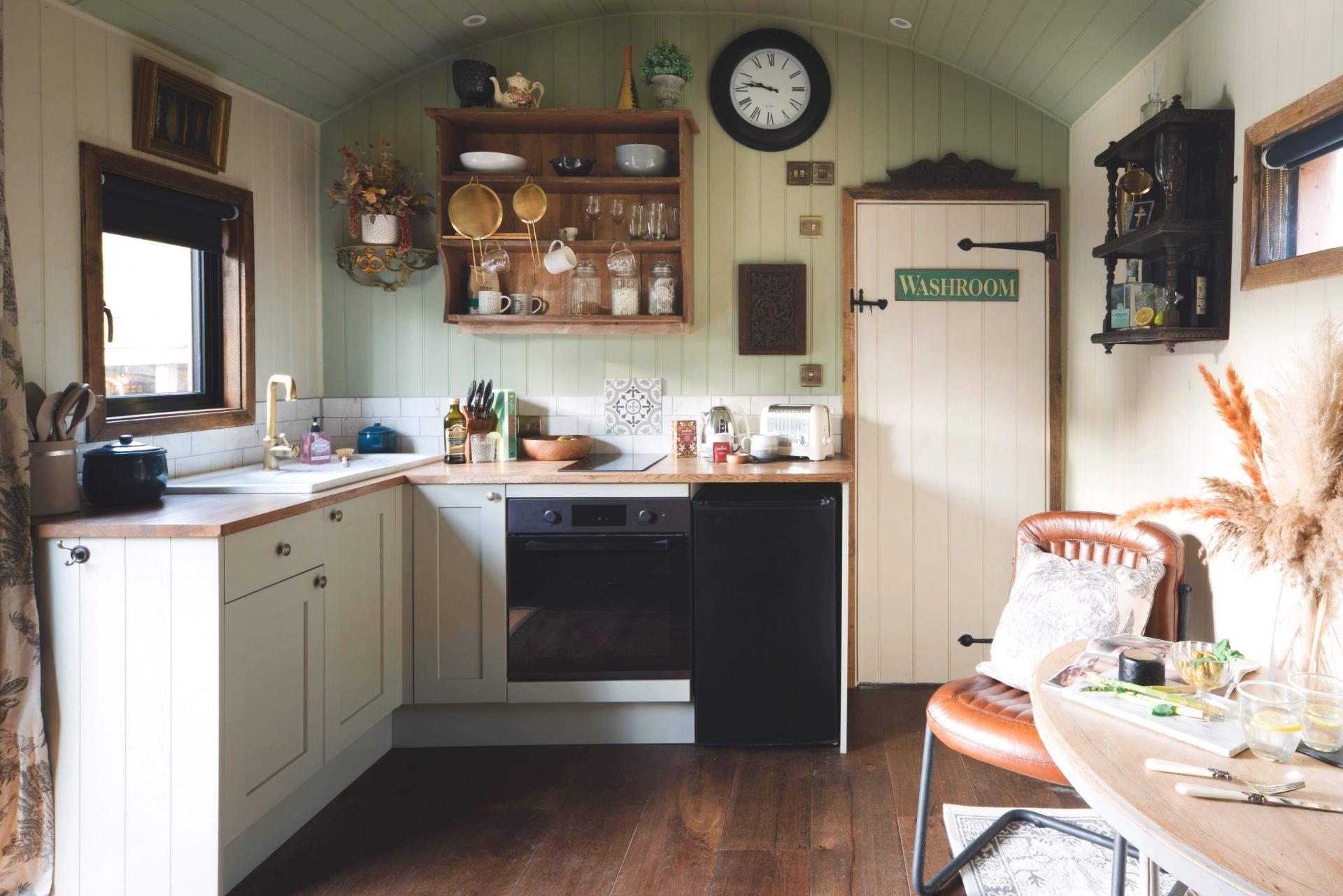 L-Shaped Kitchen and Dining Table - Hut 1898 at The Shepherds Hut Retreat