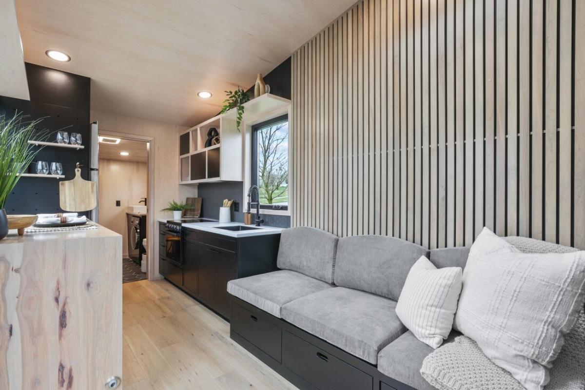 Living Room with Wood Slats Behind Couch - Sangja by Modern Tiny Living