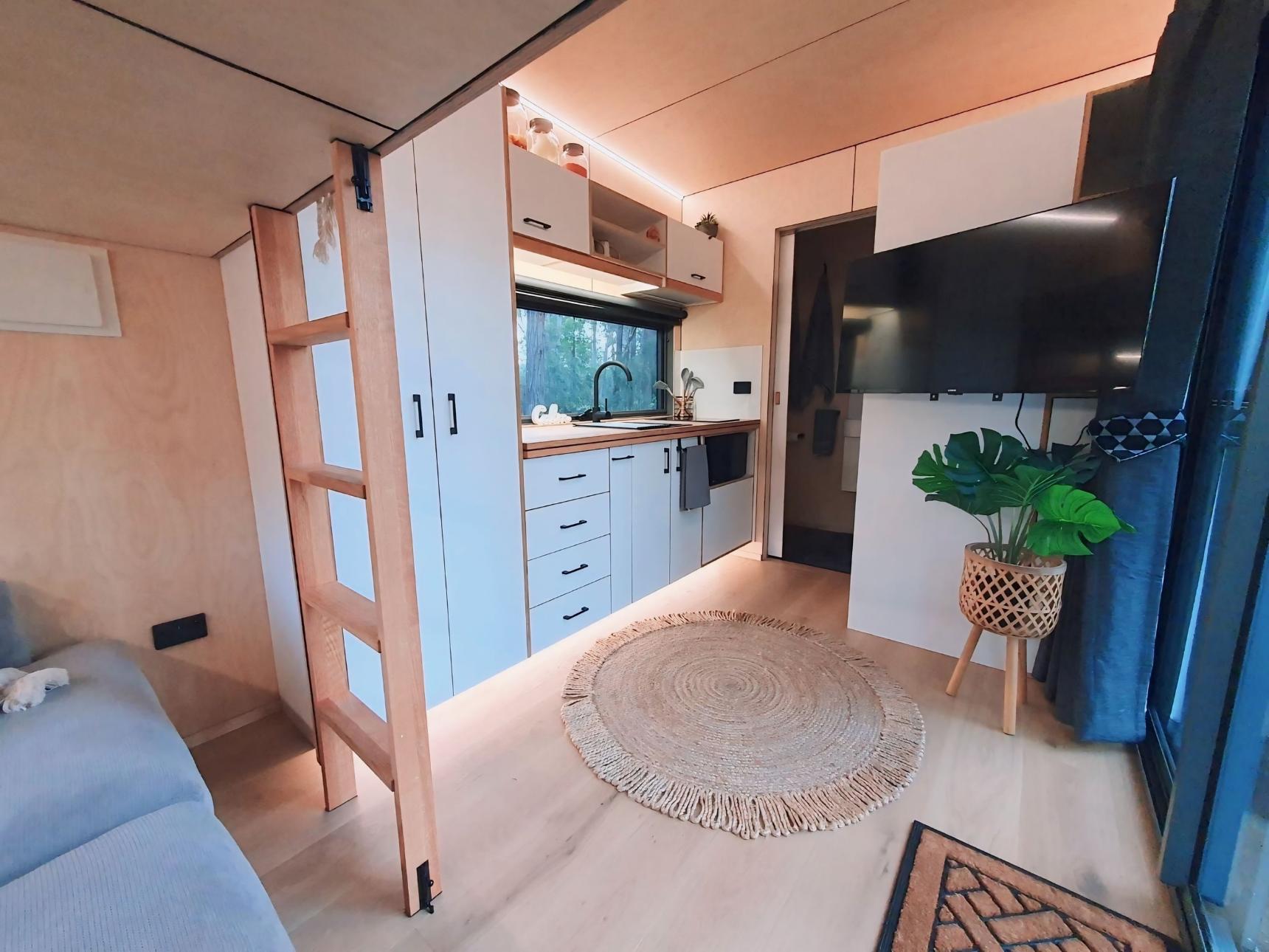 Kitchen with White Cabinets - Chipper by Häuslein Tiny House Co