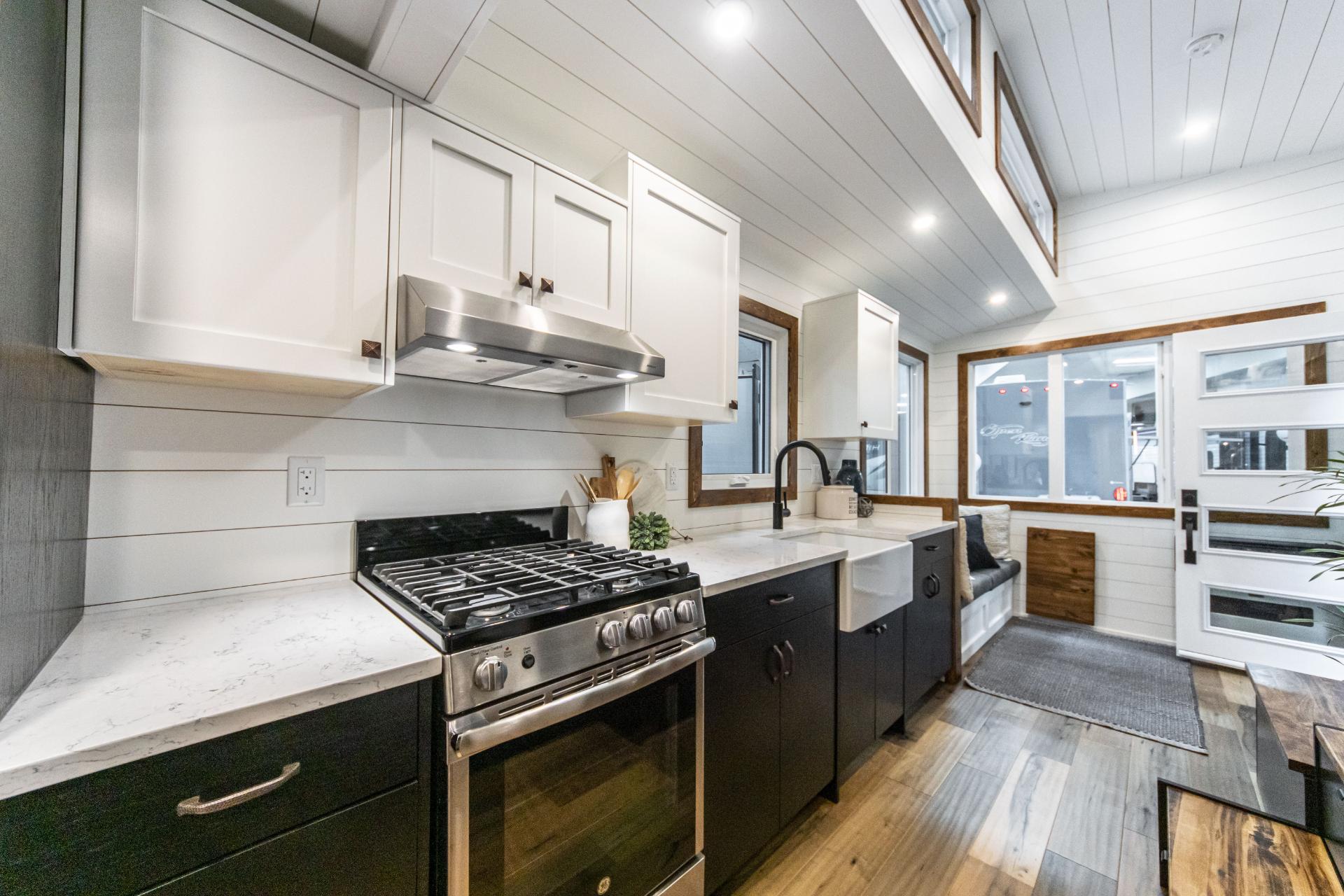 Black Base Cabinets and White Upper Cabinets - Columbia by Tree Hugger Tiny Homes