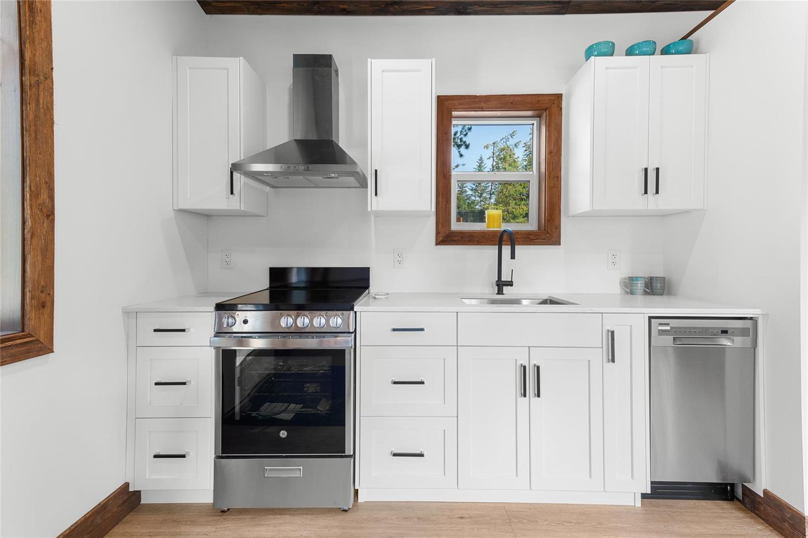 Kitchen with Full Size Range and Dishwasher - Hemlock by Rover Tiny Homes