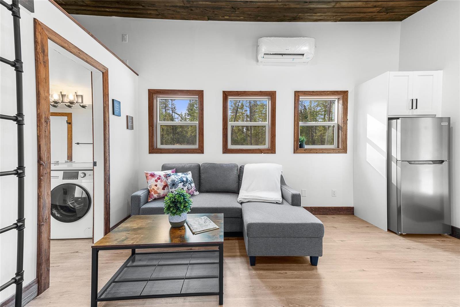 Living Room with Couch and Coffee Table - Hemlock by Rover Tiny Homes