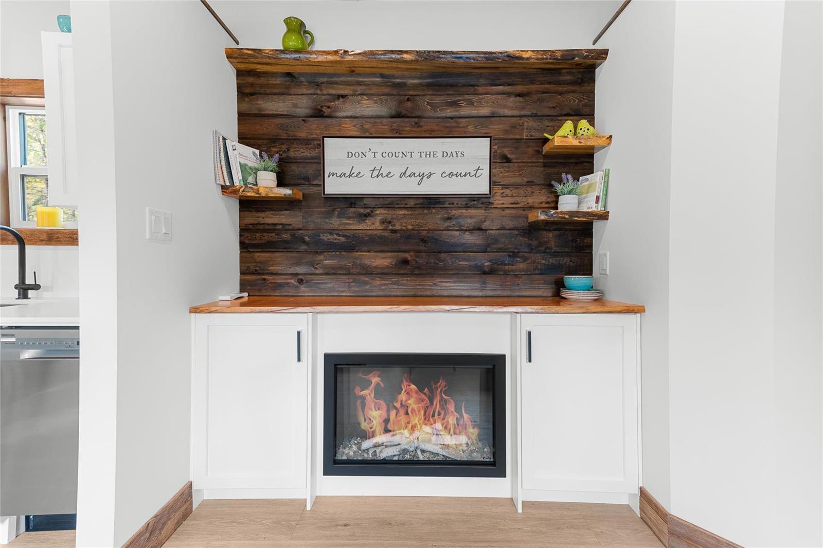 Living Room with Fireplace and Barn Wood Accent - Hemlock by Rover Tiny Homes