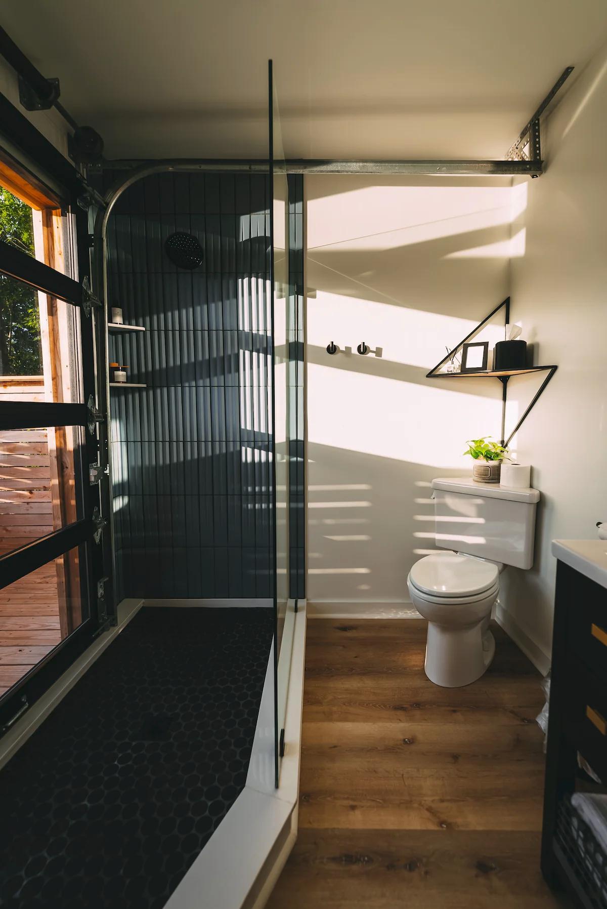 Bathroom with Tile Shower - The Hive at Addison Farms