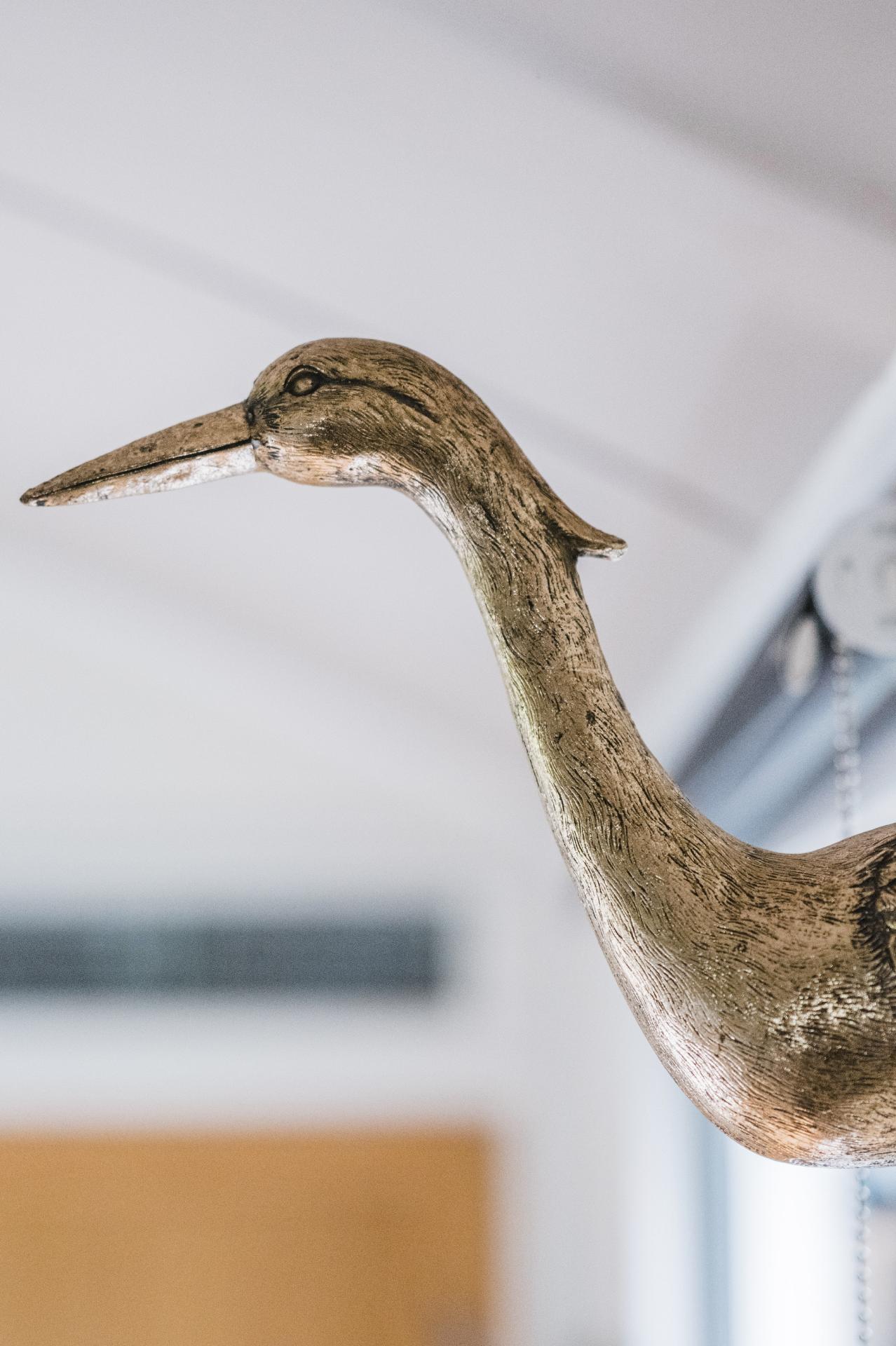 Golden Bird Head Decor - Shepherds Rest at The Shepherds Hut Retreat