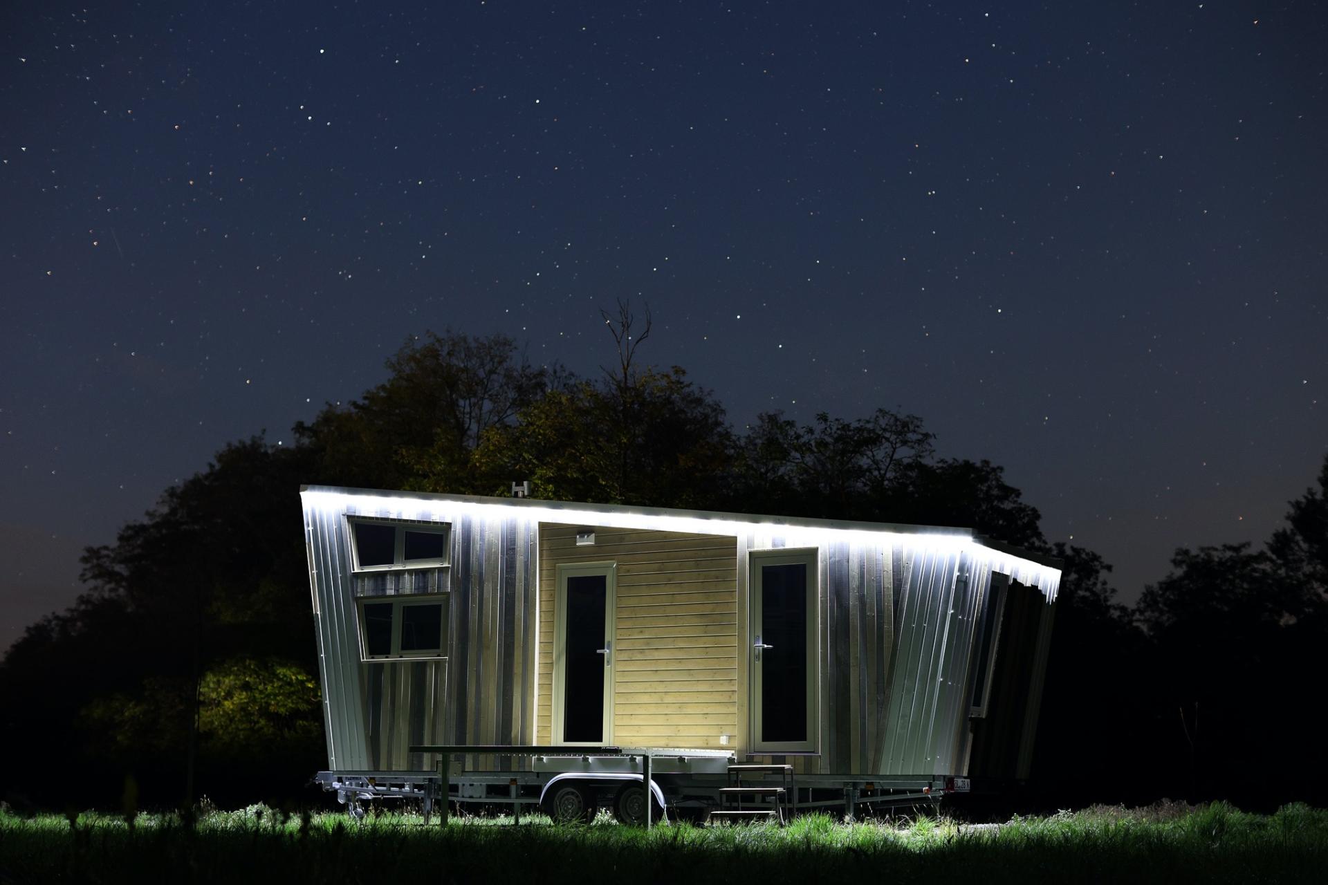 Illuminated Tiny House at Night - Saturn by Tiny Wunder House