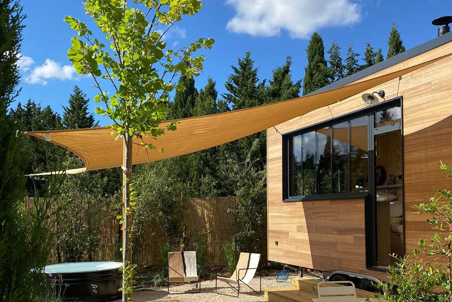 Canopy Covering Front of Tiny House - Atelier Du Mas by Plume Habitat