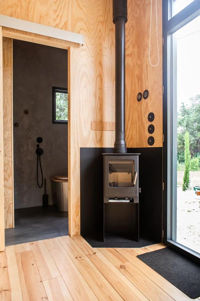 Corner Fireplace Next to Front Door - Atelier Du Mas by Plume Habitat