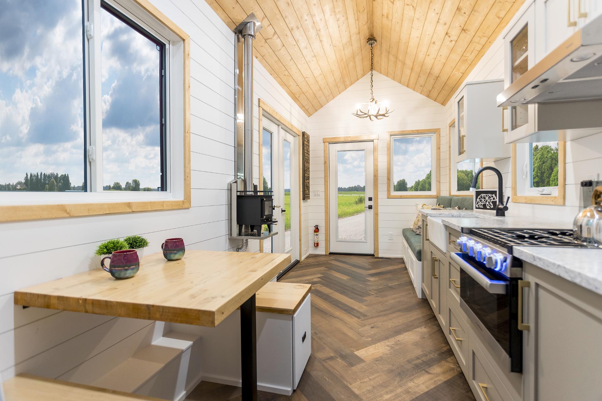 Kitchen and Built-In Table and Benches - Cascade by Tree Hugger Tiny Homes